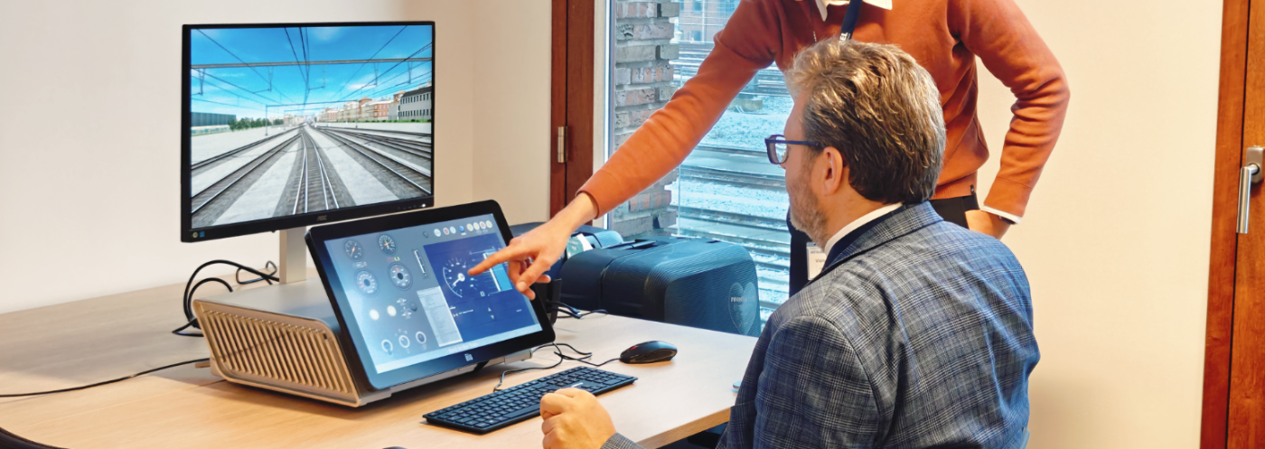 Infrabel staff using a Transurb Nano Simulator for railway training in Belgium.